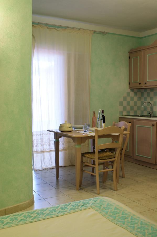 Residence Riva Azzurra Cannigione Bagian luar foto